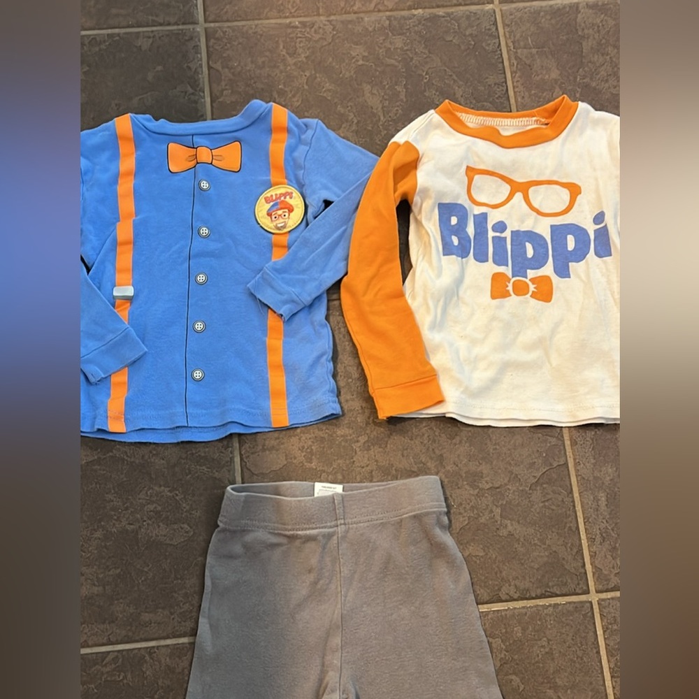Blippi pajamas, two pairs of toddler Blippi pajamas.